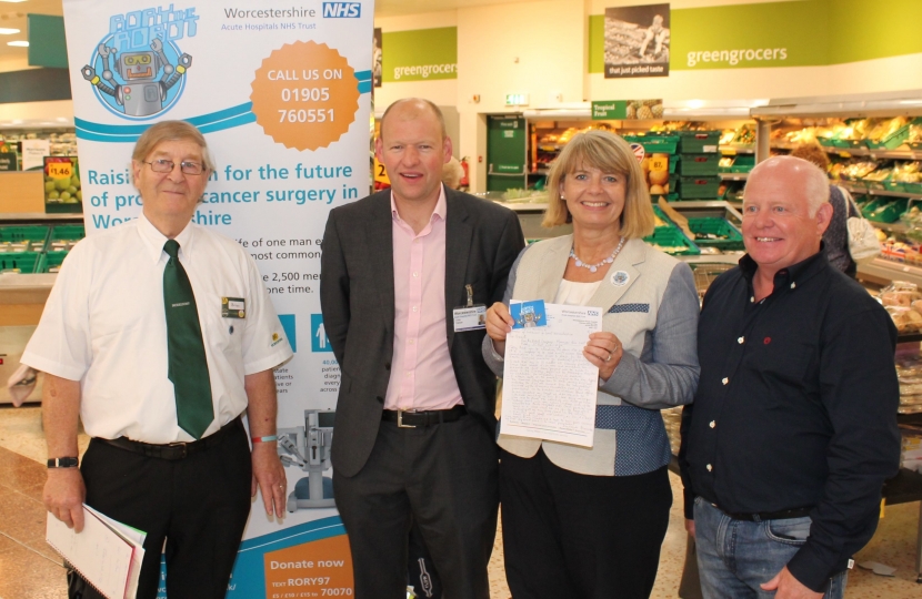 CANCER FUND-RAISERS bagged the support of West Worcestershire MP Harriett Baldwin at a Malvern supermarket charity campaign.