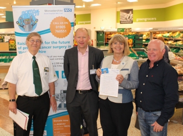 CANCER FUND-RAISERS bagged the support of West Worcestershire MP Harriett Baldwin at a Malvern supermarket charity campaign.