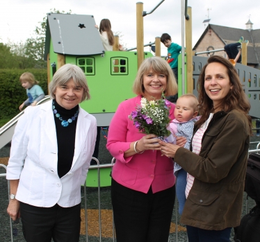 Welland parish council chair Viv Nelson, Harriett Baldwin MP and parish councillor Emma Horton-Smith with seven month old daughter Amber